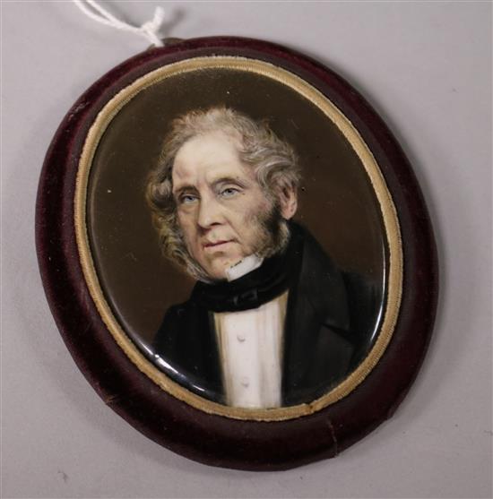 A Victorian porcelain plaque decorated with a miniature of Palmerston 7cm